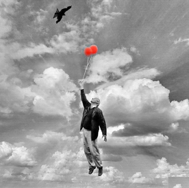 Man with Red Balloons Illustrating Individuation